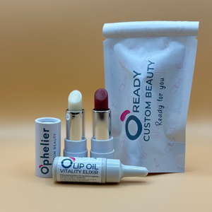 Natural vegan lipsticks and lip oil with custom beauty pouch on neutral background
