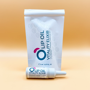 Lip oil vitality elixir tube and pouch on a beige background, vegan natural beauty product