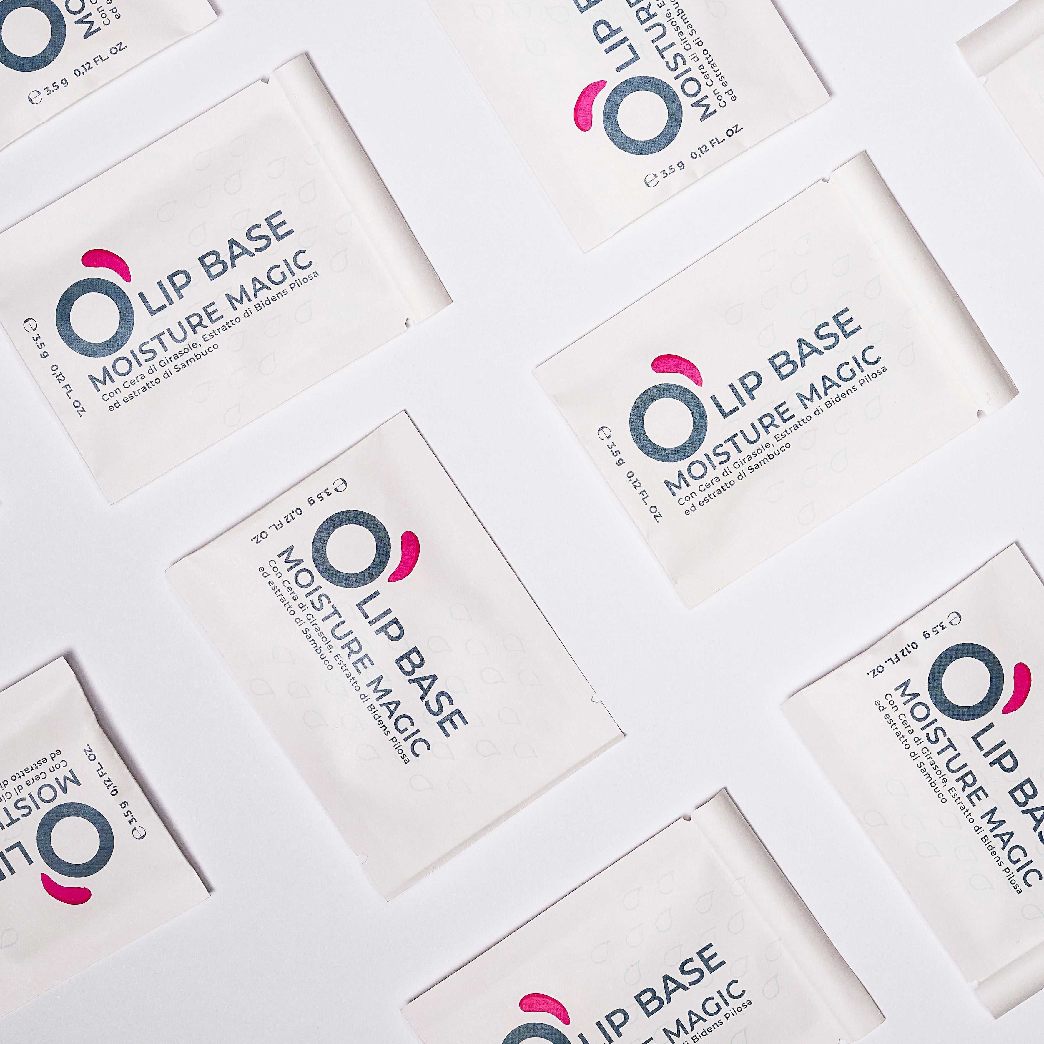 Flat lay of Lip Base Moisture Magic sample sachets, vegan natural lip care.