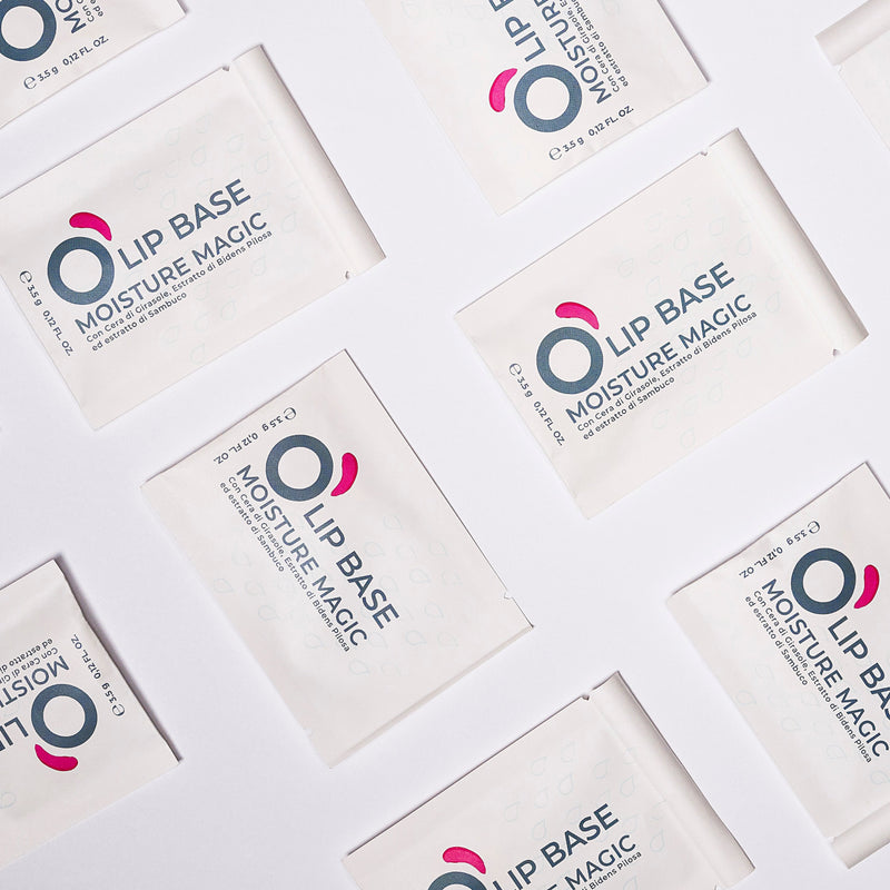 Flat lay of Lip Base Moisture Magic sample sachets, vegan natural lip care.