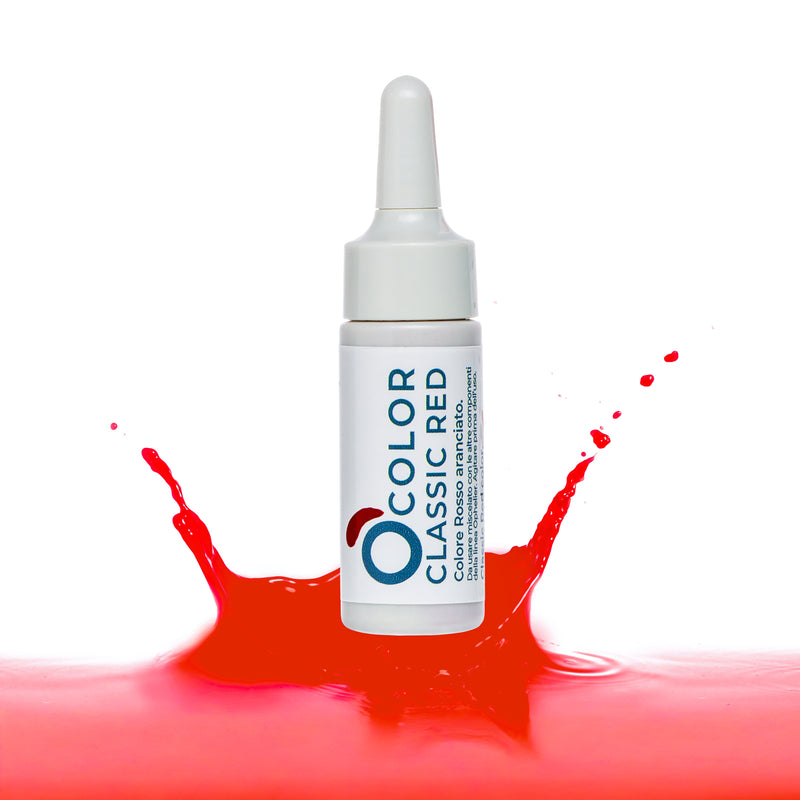 Classic Red liquid pigment bottle with dropper, splash of red color on white background