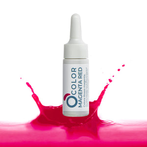 Magenta red cosmetic color dropper bottle with vibrant magenta liquid splash on white background